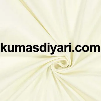Doğal ekru renkte penye kumaş rulosu