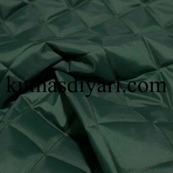 koyu yeşil kapitone kumaş kumasdiyari.com görseli