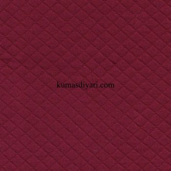 süprem üzerine kapitone kumaş kumasdiyari.com görseli
