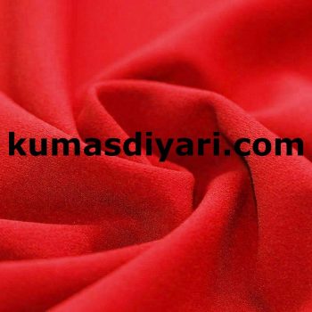 Toptan kırmızı scuba krep kumaş ambalajlı rulo halinde satılmaktadır