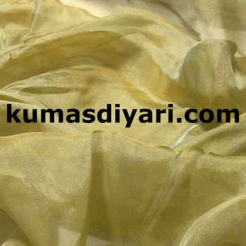 Sarı janjan şifon kumaşın ışıltılı ve parlak dokusu